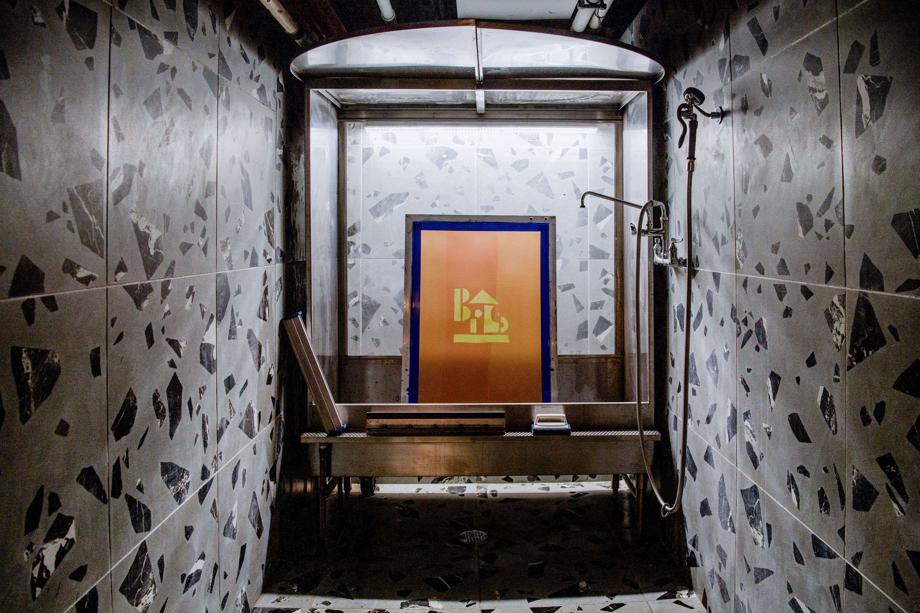 Tiled printmaking washout room with custom fabricated stainless steel sink. Photograph by Vincent Tullo.