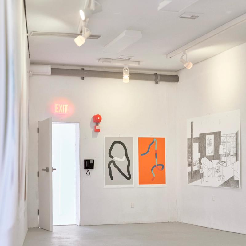 View of paper model with identical prints hung inside, gallery model at one fifth the scale of the actual gallery space